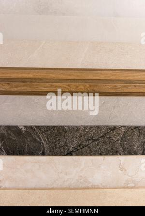 Contemporary Tile Selection Featuring Wood Accent Profiles and Marble Patterns Stock Photo