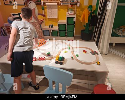 Serbia Belgrade Ikea 03.06.2026 Children Playing Wooden Train Set Indoors Stock Photo