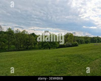 Serbia Kragujevac 05.06.2026 Green Meadow Under Dramatic Cloudy Sky Stock Photo