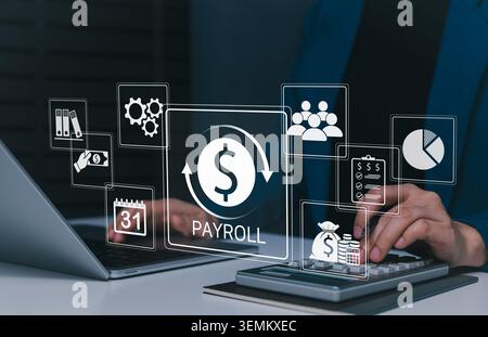 Payroll management system and employee salary processing concept. professional using laptop and calculator with payroll, money, calendar, team, Stock Photo