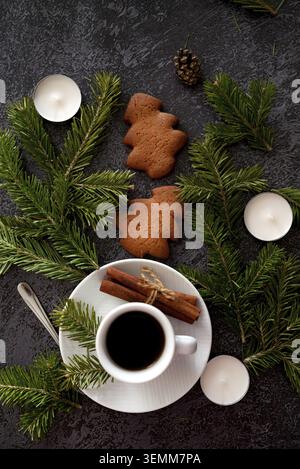 Santa Claus special delivery: view from above of chic gift boxes decorated with green bows, gold and green ornaments, star decorations, confetti on a Stock Photo