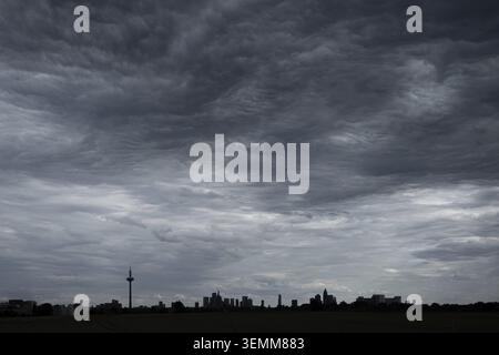 Dark clouds sweep across Frankfurt's banking skyline, Frankfurt am Main, Hesse, Germany Stock Photo