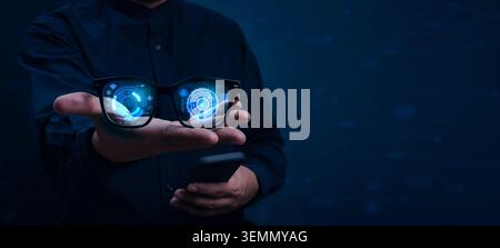 Person holding AI smart glasses with futuristic augmented reality interface and digital hologram display. Concept of wearable technology, artificial i Stock Photo