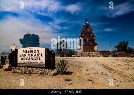 Ca, USA. 7th June, 2026. Mission San Miguel Archangel sign and a dramatic, smoke-filled sky behind the cross and bells as a a vegetation fire broke near the historic San Miguel Mission in San Miguel, California, on the afternoon of June 7, 2026, after a four-vehicle crash. (Credit Image: © Amy Katz/ZUMA Press Wire) EDITORIAL USAGE ONLY! Not for Commercial USAGE! Credit: ZUMA Press, Inc./Ģ����ý Live News Stock Photo