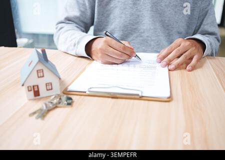 Real Estate Contract Signing For Property Purchase Mortgage Stock Photo