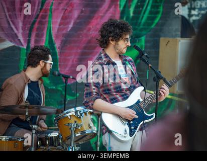Indie rock band plays a live outdoor show Stock Photo