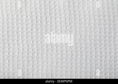 White cotton waffle weave fabric showing a detailed textile texture Stock Photo