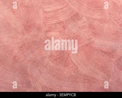 Handmade abstract background in a pinkish-light burgundy color. Painted with acrylic pink paints. A refreshing pinkish-light burgundy background. Stock Photo