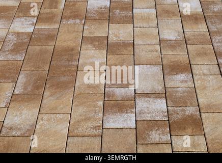 Concrete tiles for outdoor pavements.Colors are shades of brown. Background and texture. Stock Photo