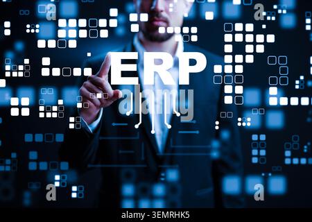 Business professional interacts with ERP system in a digital workspace setting Stock Photo