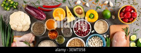 Healthy food ingredients banner with vegetables grains and protein sources Stock Photo