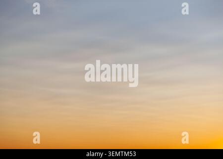 Clear and empty blue and orange gradient sky for background, horizontal image Stock Photo
