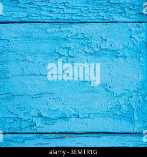textured background - wooden planks painted with cracked and peeling blue paint close-up Stock Photo