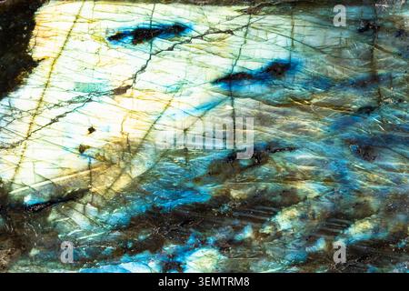 natural mineral background - surface of polished labradorite rock close-up Stock Photo