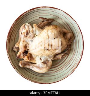 boiled chicken on ceramic plate cutout on white background Stock Photo