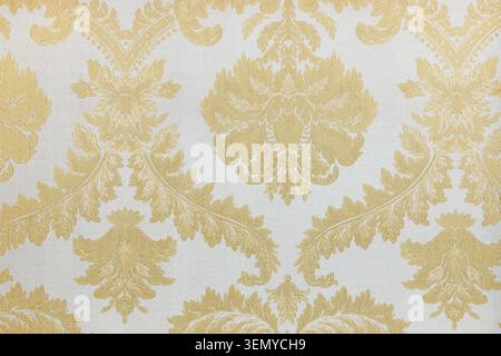 Elegant gold damask wallpaper pattern on white background Stock Photo