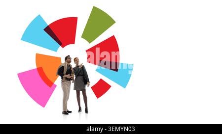 Business couple exploring colorful circular strategy chart in abstract planning scene. Stock Photo