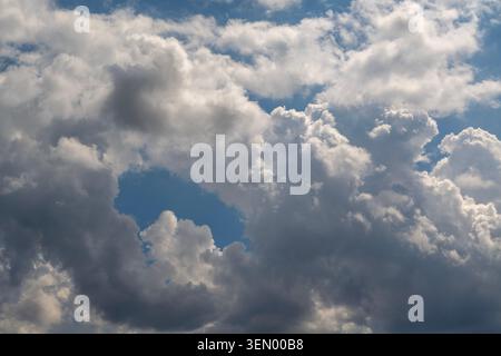 Dramatic sky with massive storm clouds covering most of the frame. Stock Photo