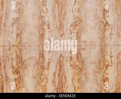 Large pinkish travertine tiles. Full frame, background and texture. Stock Photo