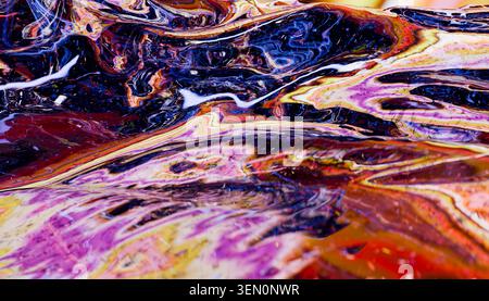 Abstract fluid art with vibrant swirls of purple, blue, red, and yellow hues. Illustration, rendering Stock Photo