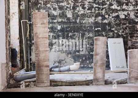 This captures an empty apartment interior in an old building in Berlin s Prenzlauer Berg district, showcasing the state of disrepair before renovation Stock Photo