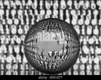 Transparent globe with binary code projected on its surface, in a digital black and white theme. Stock Photo