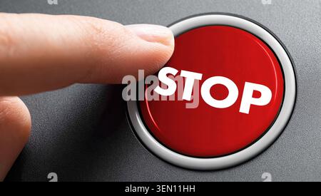 Stop button being pressed – a symbol of control, risk management, safety, and the immediate halting of processes or critical situations Stock Photo
