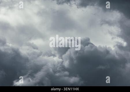 Dramatic gray clouds. Dark gloomy sky texture for background. Stock Photo