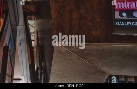 Details of an overhanging array of video screens in a restaurant Stock Photo