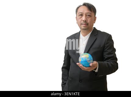 Professional portrait of a confident Asian businessman holding a globe isolated on a white background. Global business concept representing internatio Stock Photo