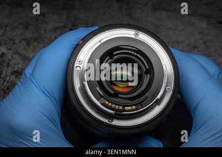 Camera lens with bayonet mount and coated lens, close-up Stock Photo