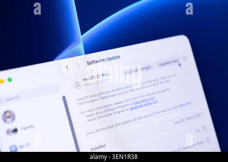 Poznan, Poland - June 9, 2026: Apple macOS 27 beta system update interface displayed on a monitor for installing new OS versions, highlighting modern Stock Photo
