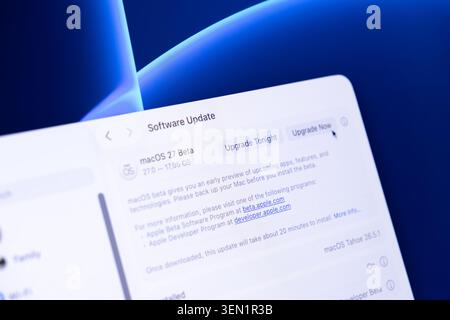 Poznan, Poland - June 9, 2026: Apple macOS 27 beta version update window shown on a monitor screen to prompt a system installation for an advanced com Stock Photo