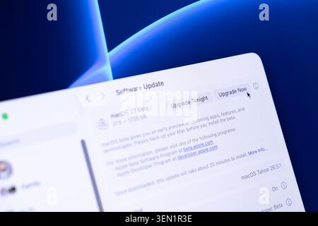 Poznan, Poland - June 9, 2026: A close view of the Apple macOS 27 beta installation window on a digital display, highlighting the process of upgrading Stock Photo