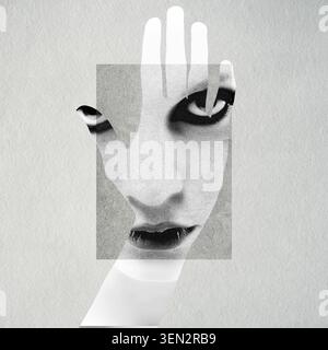 Hand silhouette covering a woman's abstract portrait on textured background Stock Photo