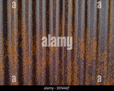Dark Wavy Rusted Tin Background Stock Photo
