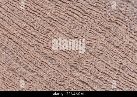 Diagonal Beige Gauze Fabric Texture Close Up Stock Photo