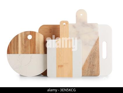 Assorted kitchen cutting boards with wood and marble textures, culinary preparation and serving utensils, these culinary preparation and serving utens Stock Photo