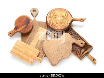 Assortment of wooden cutting boards and serving platters for kitchen and food preparation, isolated on white background Stock Photo