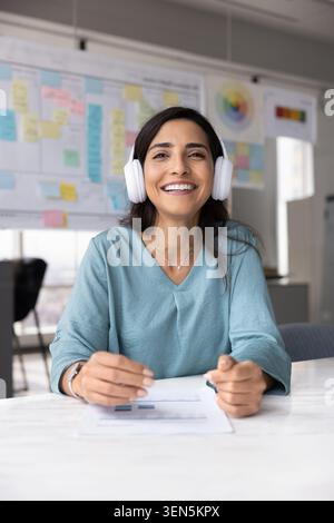 Businesswoman, smile at camera, attending remote online meeting Stock Photo