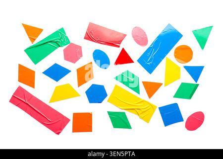Colorful geometric shapes and forms made from adhesive tape on a clean white background, creative design elements Stock Photo