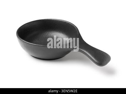 Empty black ceramic sauce dish with handle, modern kitchenware for culinary presentation, isolated on white background Stock Photo
