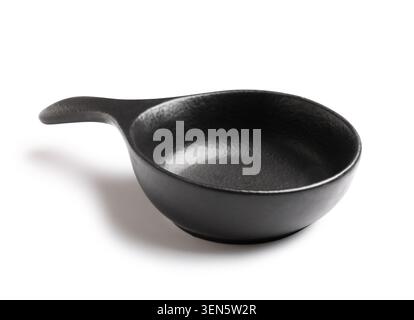 Empty black ceramic sauce bowl with handle, kitchen utensil for serving condiments and dips, isolated on white background Stock Photo