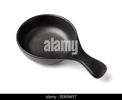 Empty black ceramic sauce dish with handle, kitchenware and tableware for food presentation, isolated on white background Stock Photo