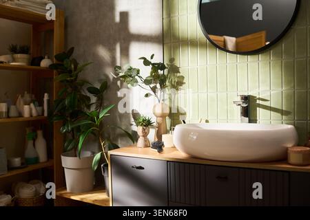 Modern Bathroom Vanity Featuring Skin Care and Self Care Products Stock Photo