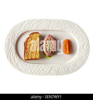Chicken liver pate with toast and carrot puree Stock Photo