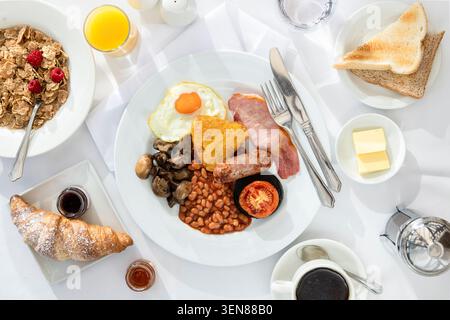 Delicious Breakfast Spread Featuring Classic English Dishes on a Bright Morning Table Stock Photo