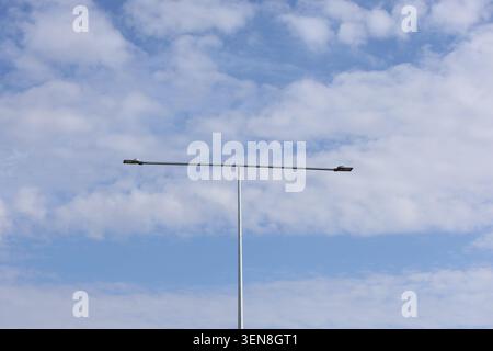 street lamp against blue sky Stock Photo