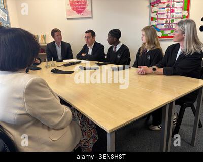 Esther Ghey (right) the mother of murdered teenager Brianna Ghey, joins the Duke of Westminster Hugh Grosvenor and Cheshire Police and Crime Commissioner Dan Price (fourth right) on a visit to Sir William Stanier school in Crewe, as it becomes one of the latest in Cheshire to introduce the signal-blocking pouches, which are locked after pupils place their phones into them at the start of the day. The mother of murdered teenager Brianna Ghey said it felt emotional to see "positive change" as she visited a school which has introduced lockable pouches to stop students using their phones during th Stock Photo