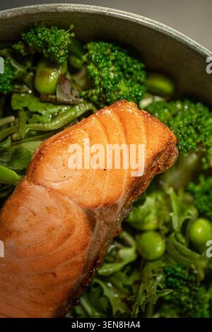 Grilled salmon fillet with broccoli bowl Stock Photo